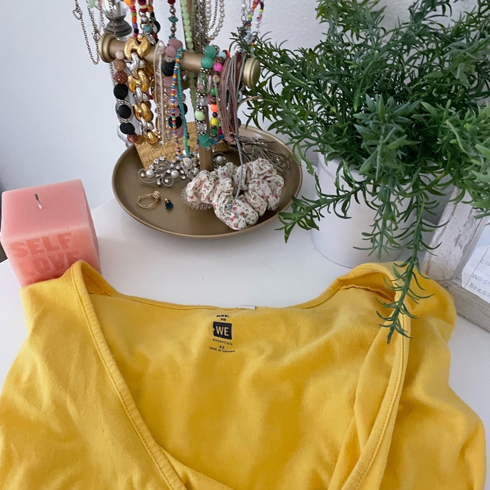 yellow low-cut top